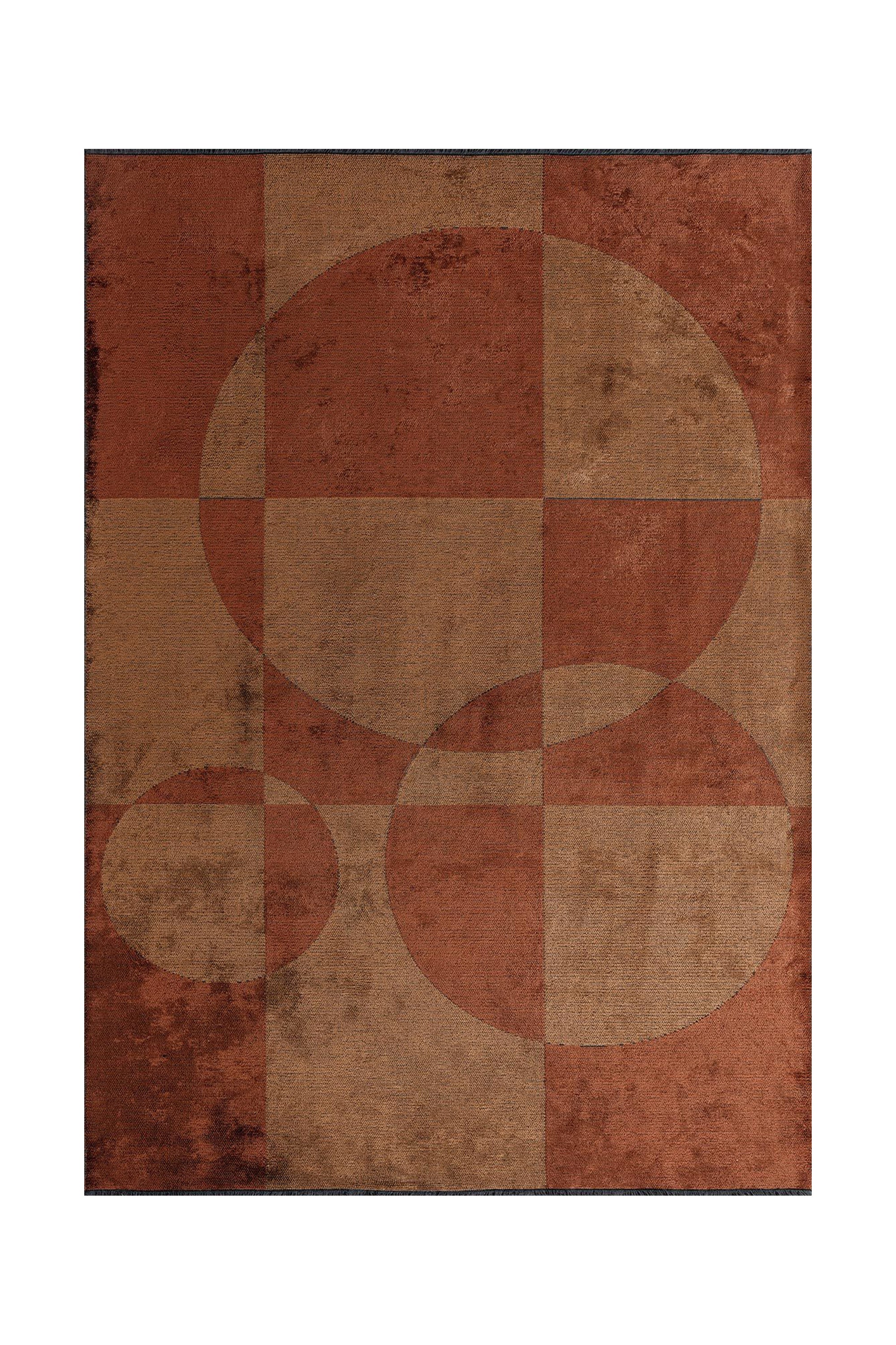 Top-down view of a flat-woven rug in warm caramel and brown tones, featuring overlapping circular motifs arranged in a subtle grid pattern.