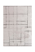 Minimalist beige area rug with an abstract black line grid pattern.