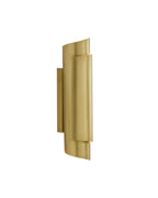 Introvert Wall Sconce with a brushed brass finish, featuring a vertical layered design that softly diffuses ambient light.
