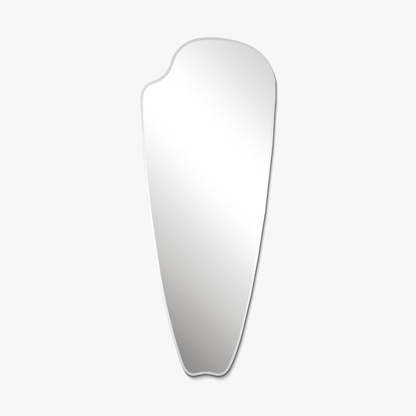 Frameless elongated mirror with an organic, asymmetrical silhouette on a white background.