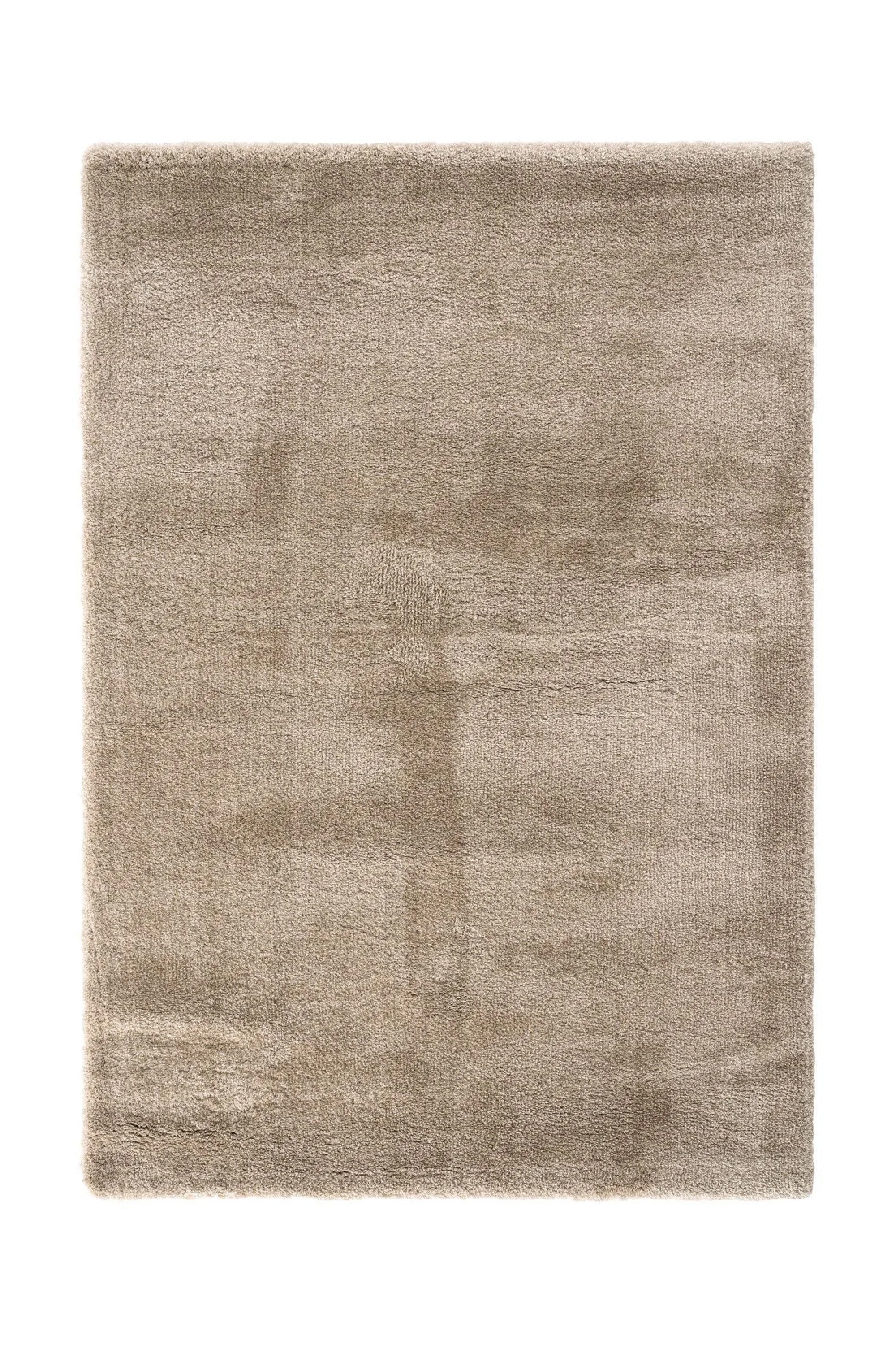 Brown rectangular handcrafted rug with a soft, plush texture and subtle tonal variation.