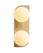 Vertical travertine wall sconce with two round opaque white glass globes for soft, modern lighting.