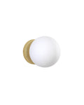 Round wall sconce with an opaque white glass globe and a polished brass wall mount.
