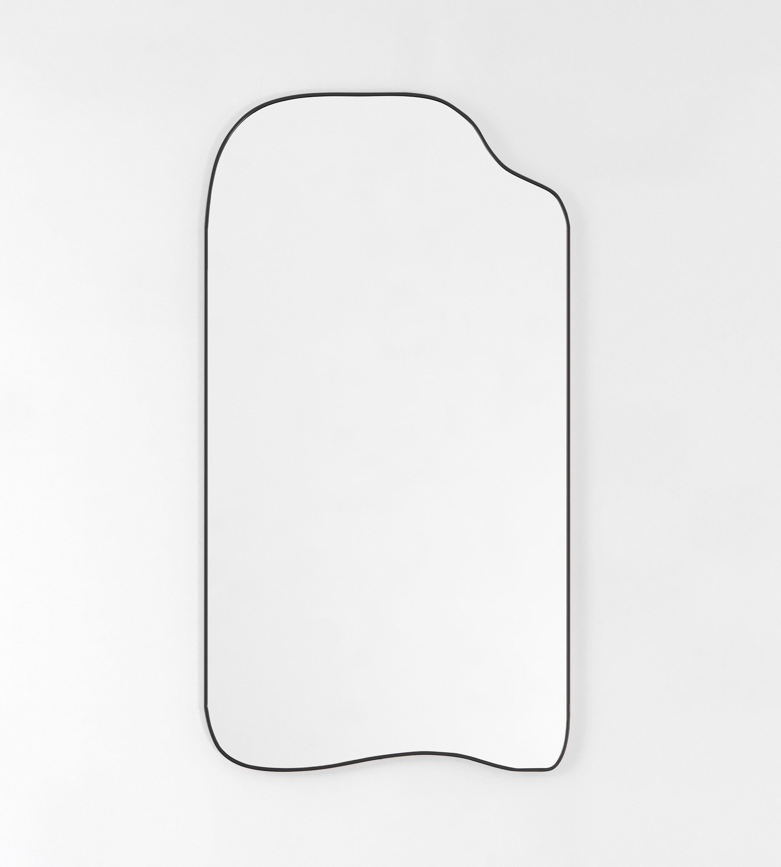 Asymmetrical full-length mirror with an organic shape and thin black frame on a white background.