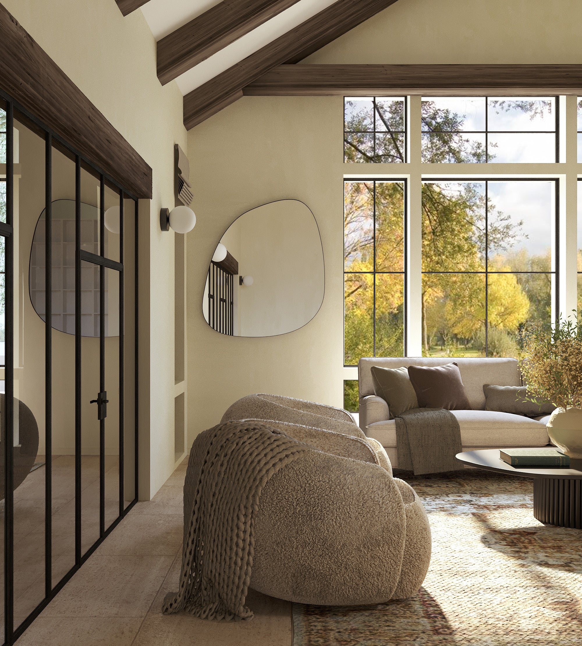 Living room interior with large windows and exposed wood beams, featuring round white glass wall sconces mounted beside a mirror.