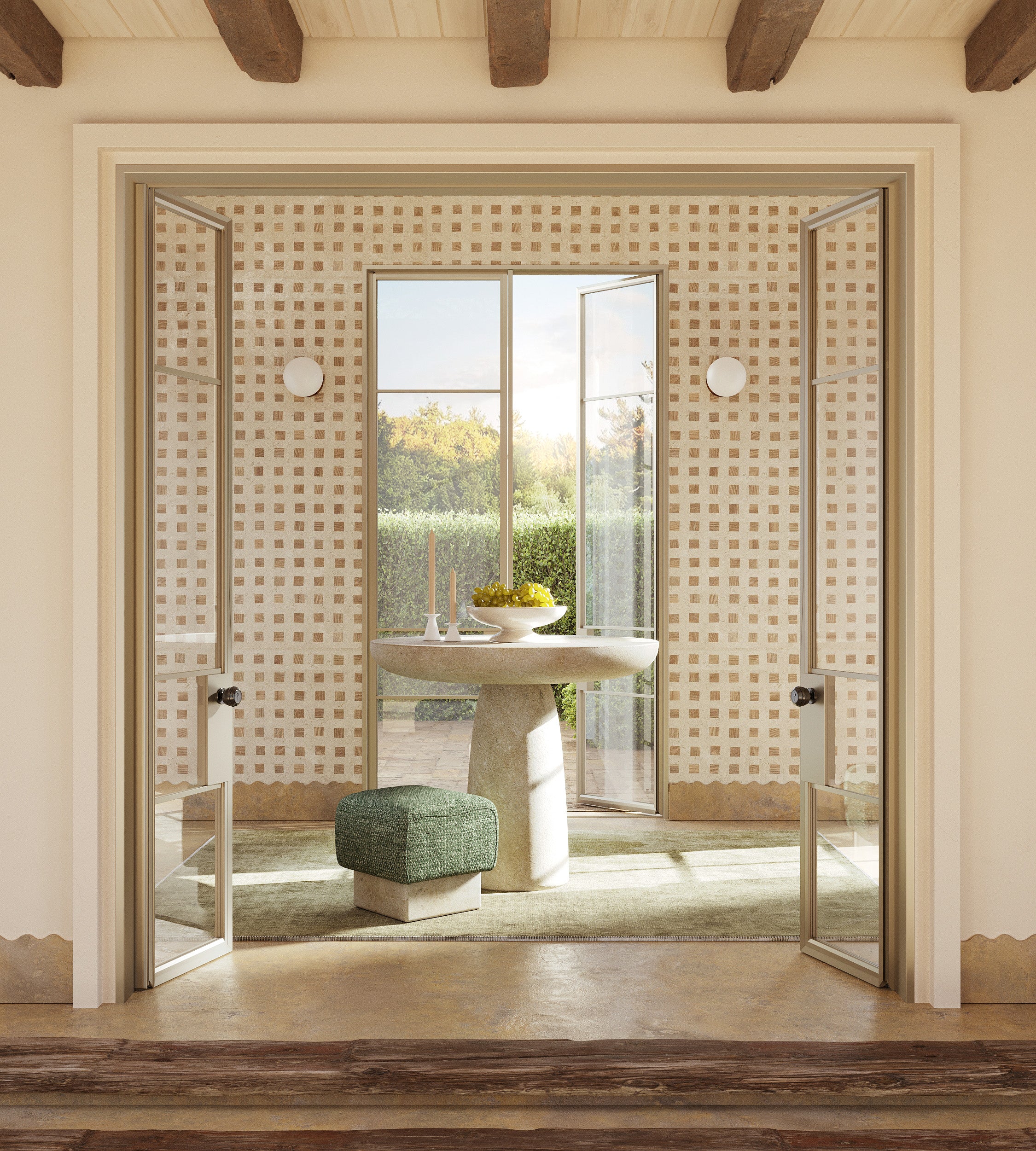 Interior dining area with a stone table and stool, featuring two round wall sconces with white glass globes mounted on a patterned wall.
