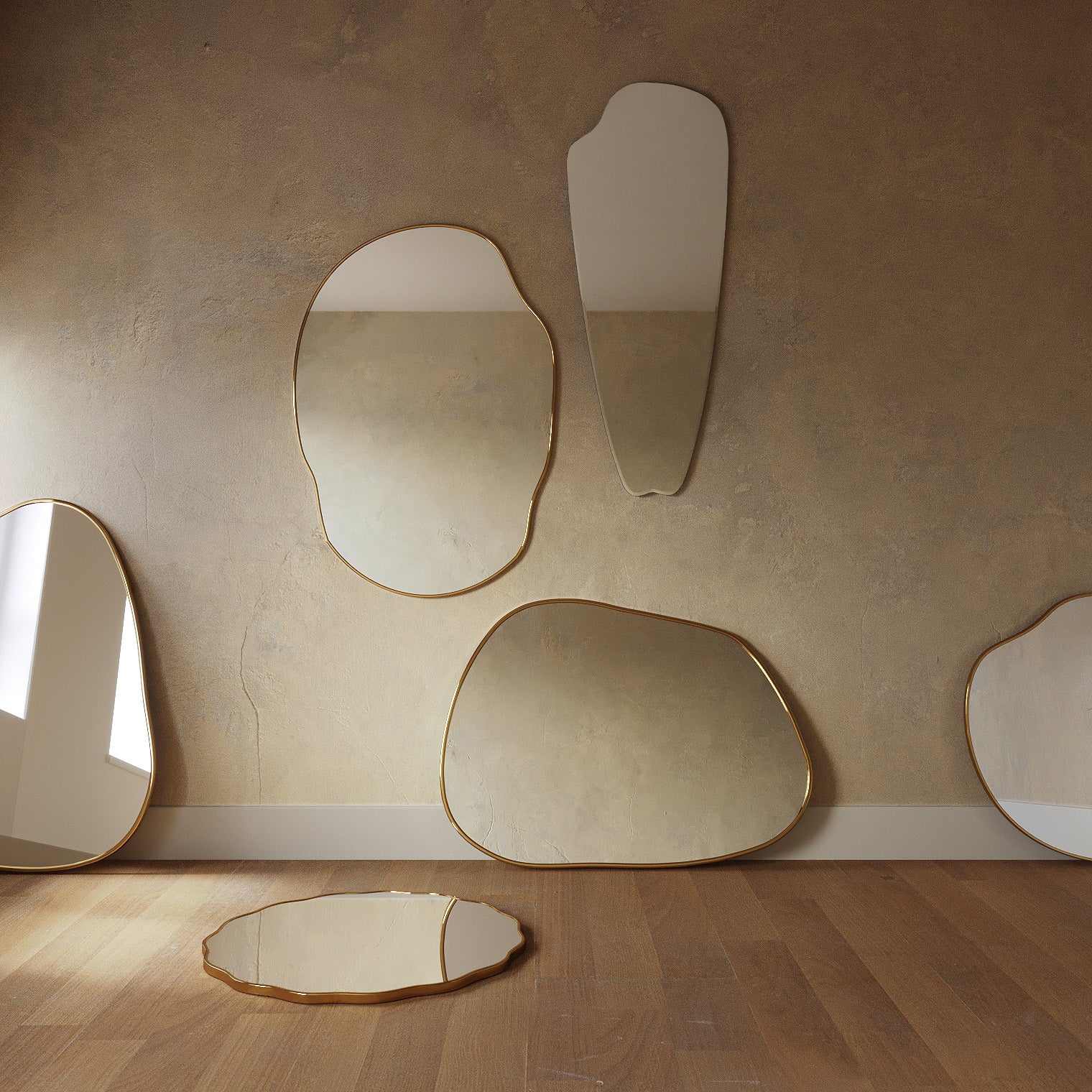 Collection of wall and floor mirrors with irregular shapes in a minimalist interior.