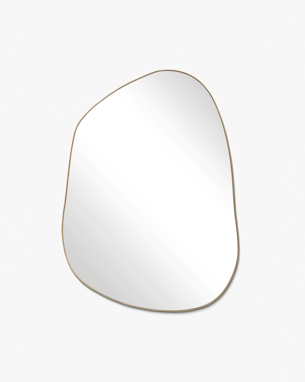 Asymmetrical mirror with an organic shape and a thin brass-colored frame on a white background.