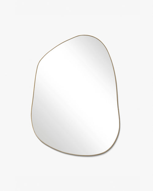 Asymmetrical mirror with an organic shape and a thin brass-colored frame on a white background.