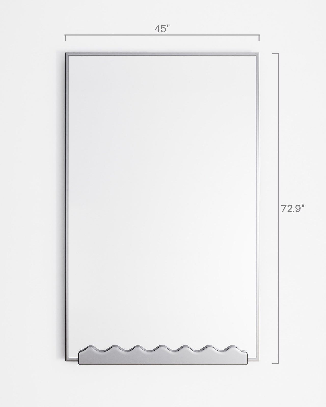 Front view of a full-length rectangular mirror showing dimensions: 45 inches wide and 72.9 inches tall, with a slim stainless steel frame and a decorative wavy detail at the bottom.