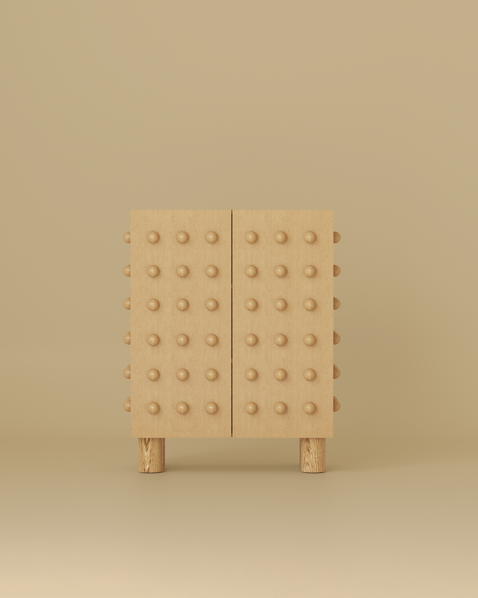 Wooden storage cabinet with a sculptural front featuring evenly spaced rounded wooden spheres and a clean rectangular form.