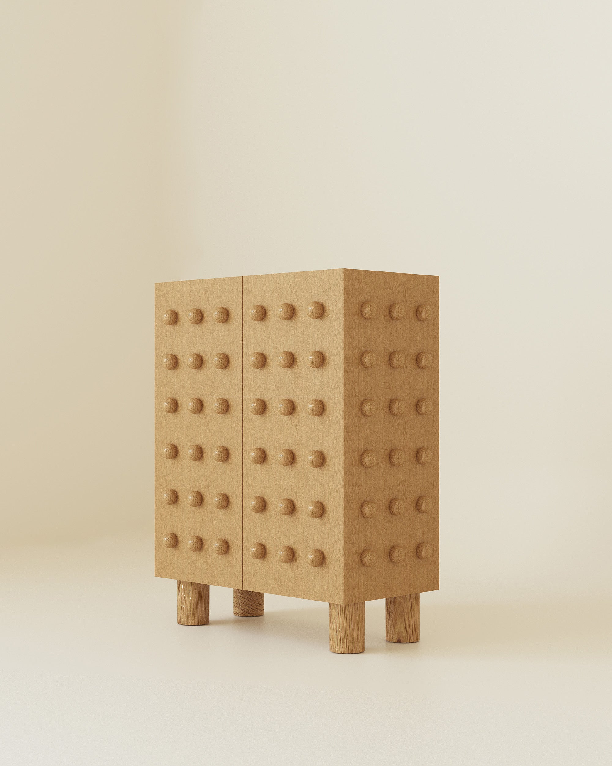 Wooden storage cabinet with a clean rectangular form, featuring evenly spaced rounded wooden spheres across the front and sides, standing on short cylindrical wooden legs.
