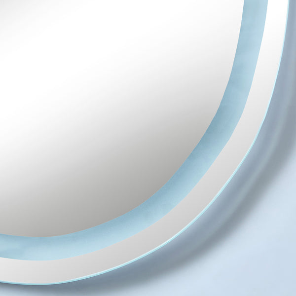 Close-up of an organic-shaped LED mirror with a cool white illuminated edge.