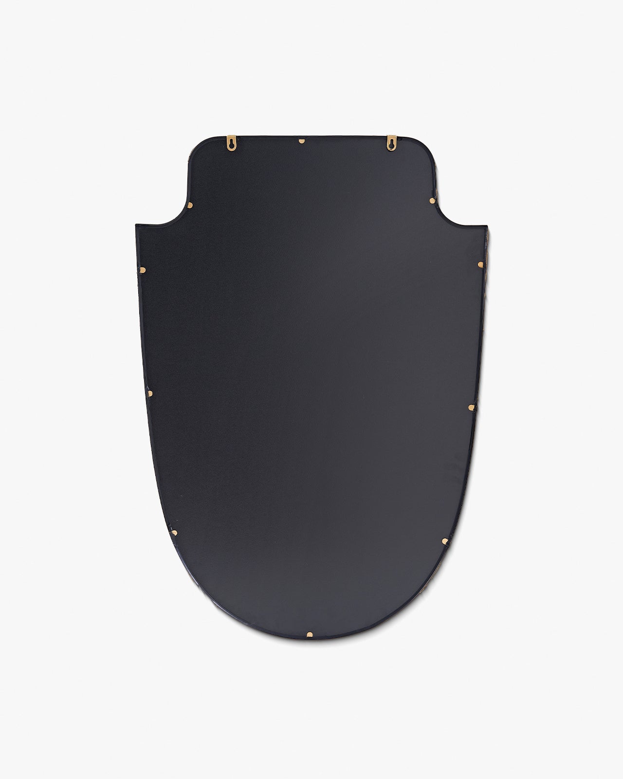 Back view of a shield-shaped wall mirror showing mounting hardware for vertical installation.