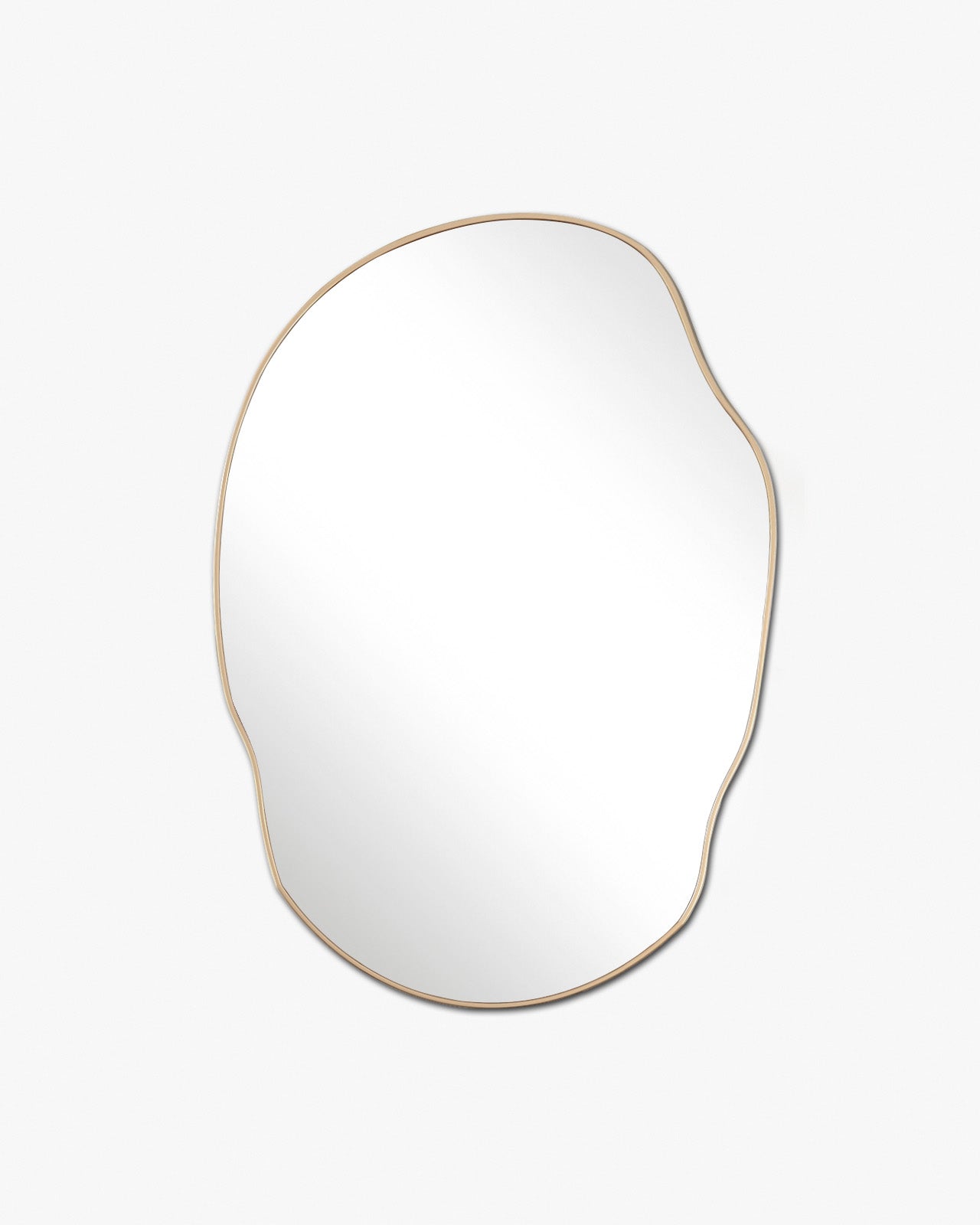 Irregular-shaped wall mirror with a thin brass-colored frame on a white background.