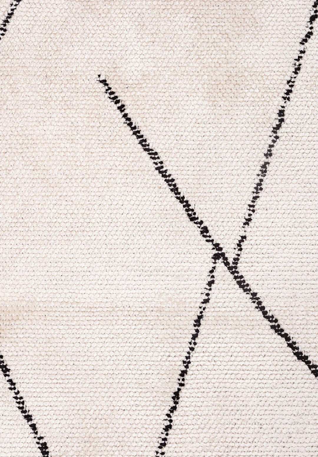 Beige rug with thin black line pattern.