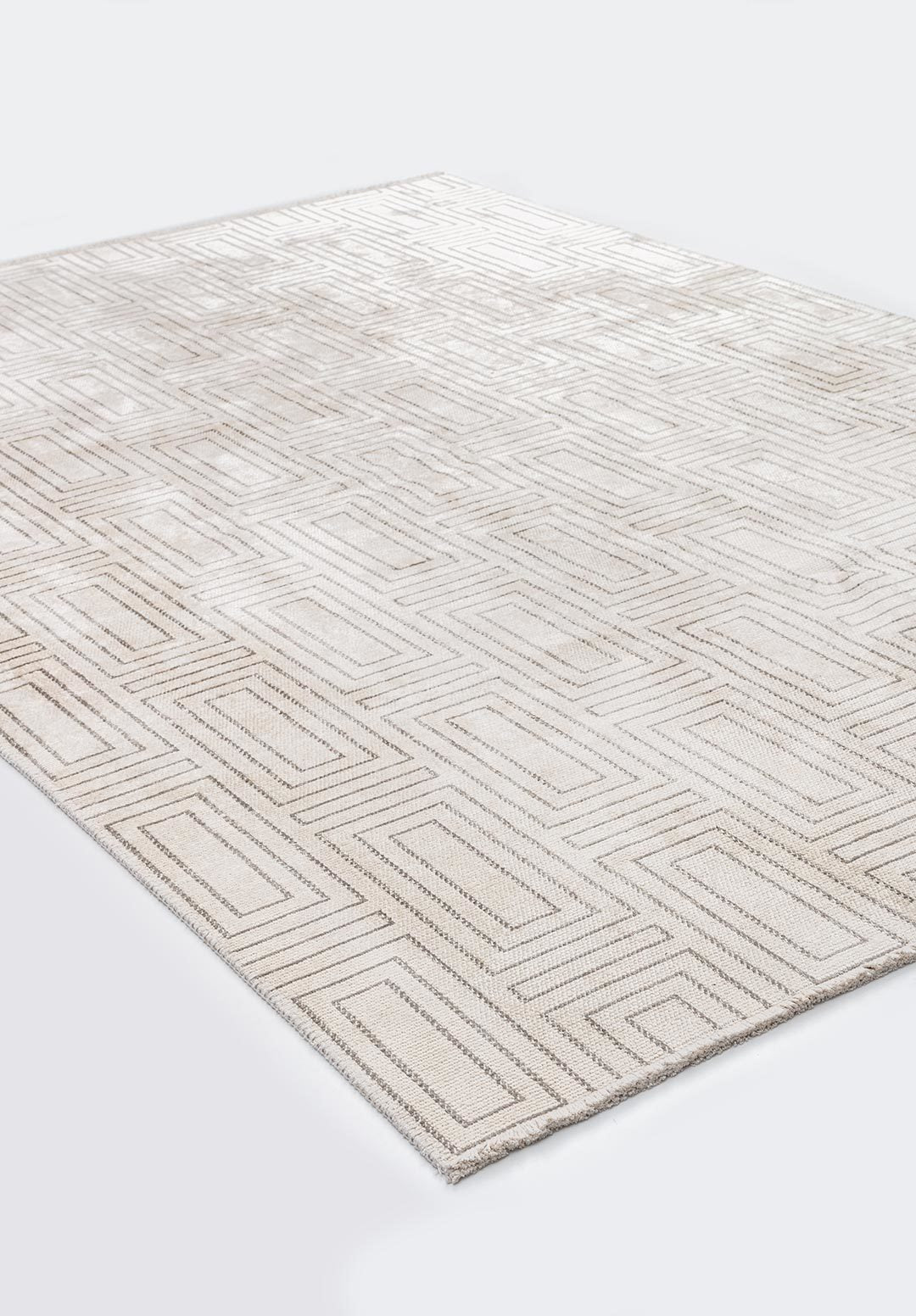 Geometric flat-woven rug with subtle textured pattern.